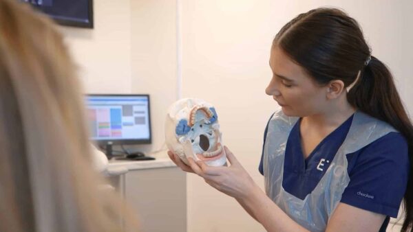 EvoDental Liverpool Clinic Nurse Talking to Patient