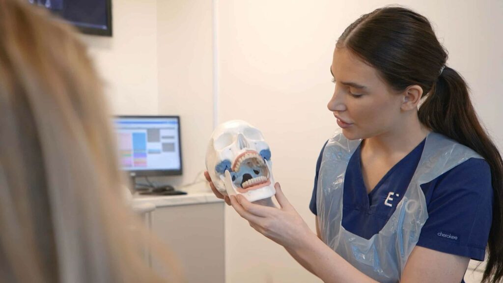 demonstration of a full mouth dental implant and prosthesis